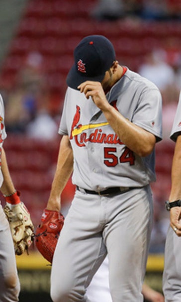 Cardinals rough up Reds Simon, roll to 12-7 win